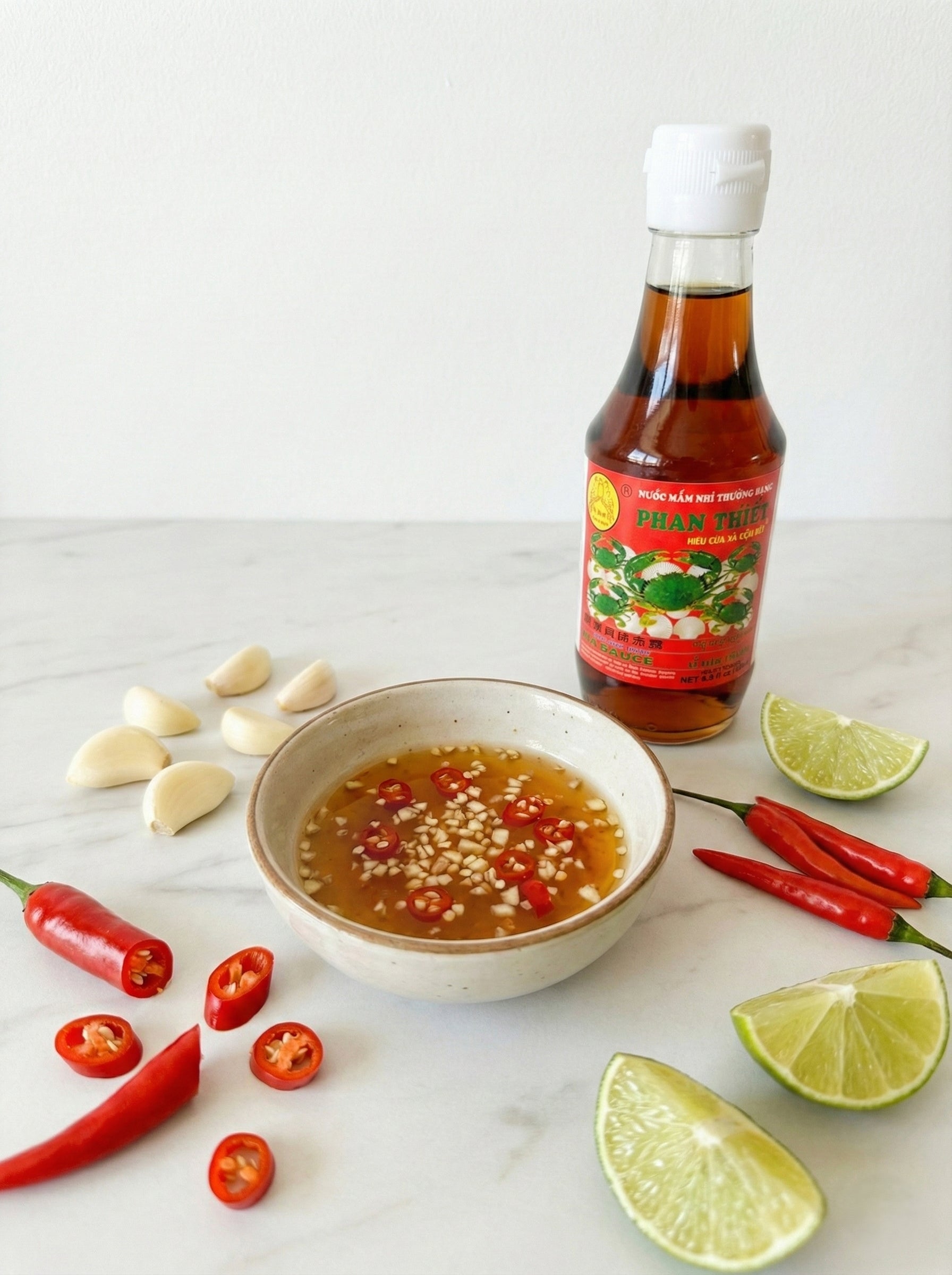 Double Parrot Phan Thiet crab scallop enhanced fish sauce Vietnamese nuoc mam premium seafood dipping sauce