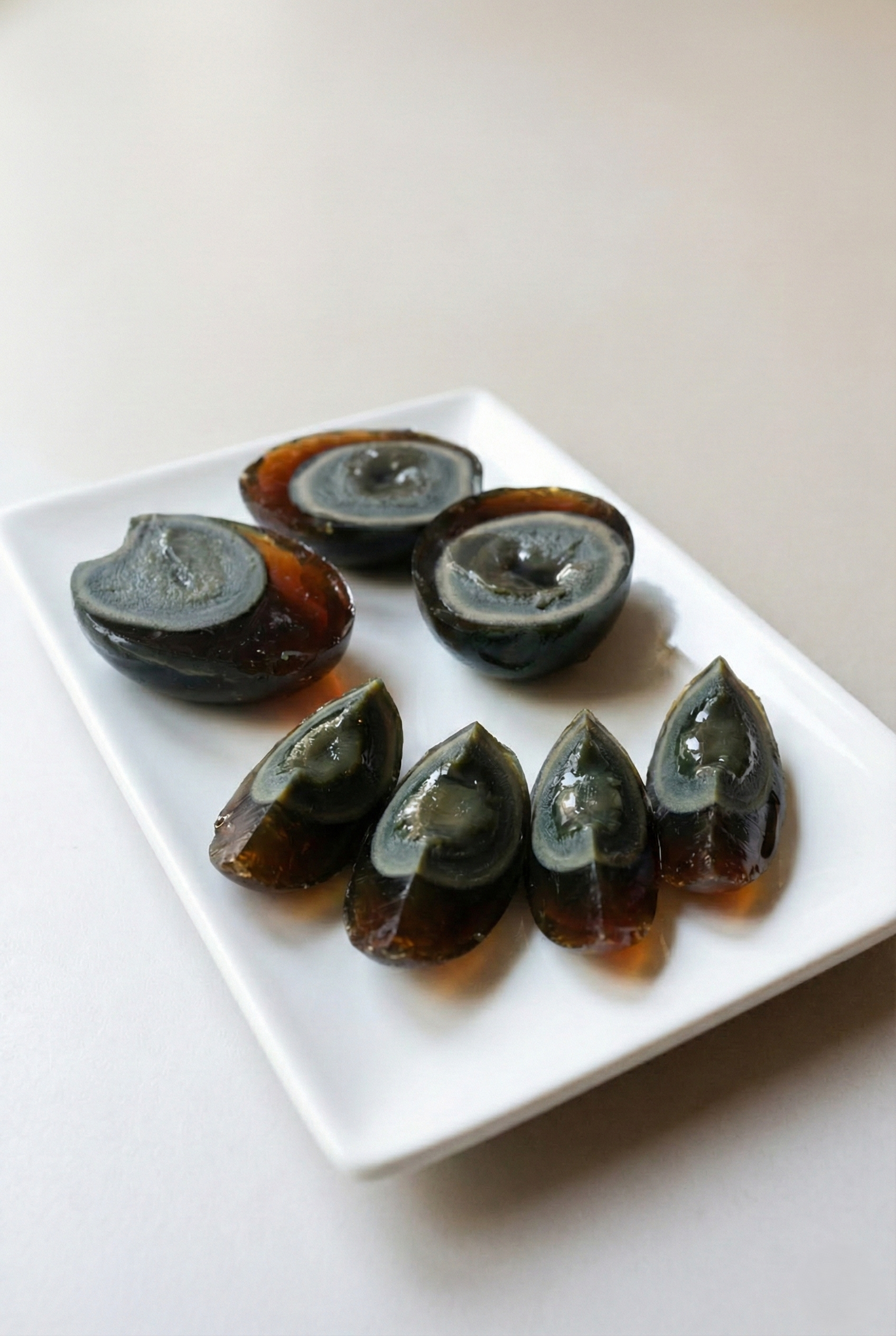 Pi dan preserved duck egg Taiwanese century egg amber jelly alkaline cured umami congee ingredient